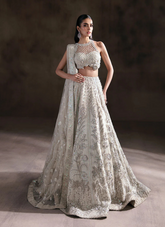 Ivory Halter Neck Bridal Lehnga Choli with Intricate Embellishments
