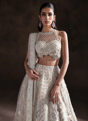 Ivory Halter Neck Bridal Lehnga Choli with Intricate Embellishments