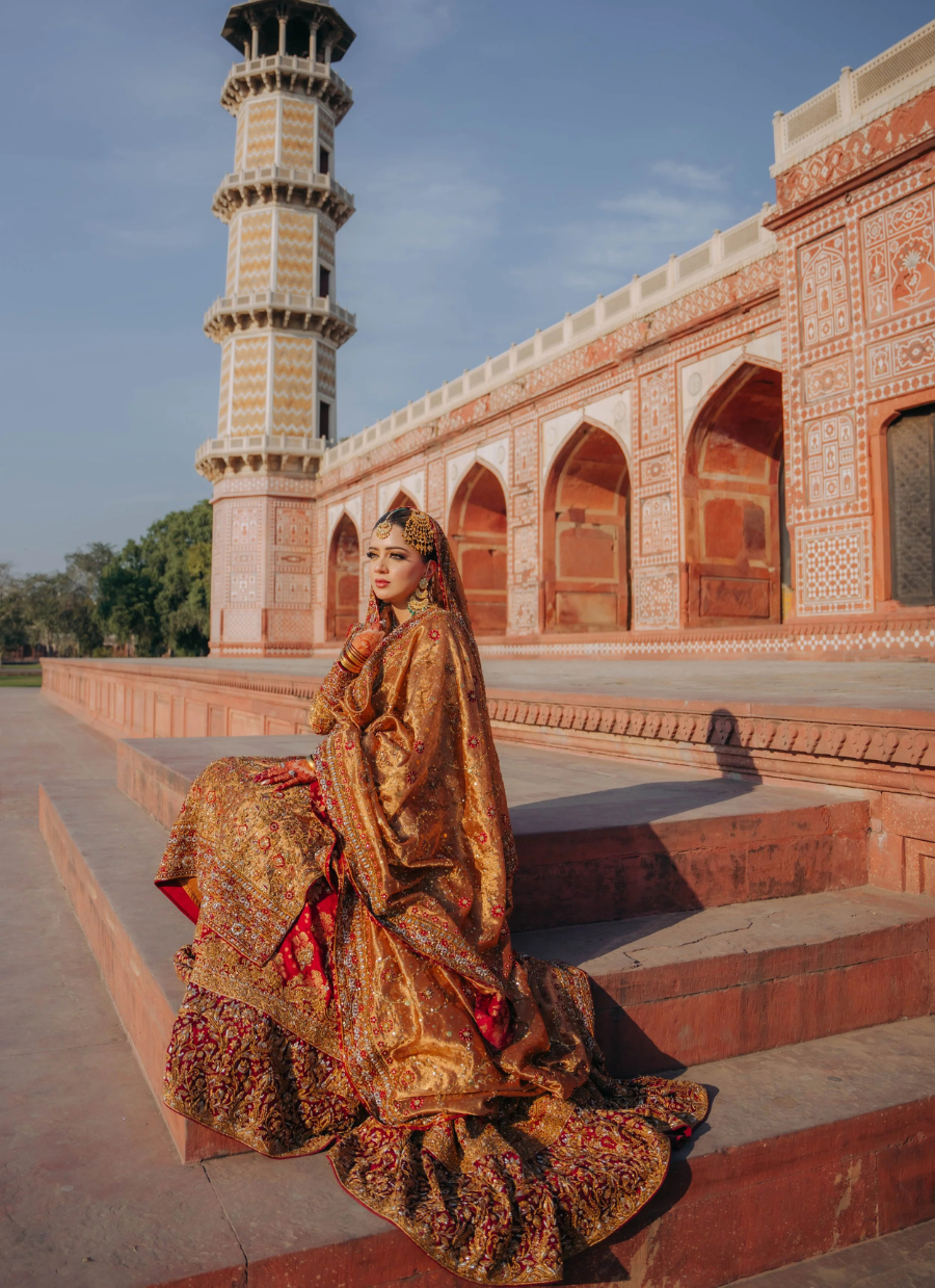 18 Golden and Red Traditional Bridal Dress with Heavy Embellishment
