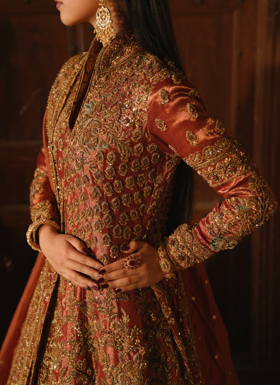 19 Rust Orange Heavily Embellished Bridal Gown with Regal Detailing