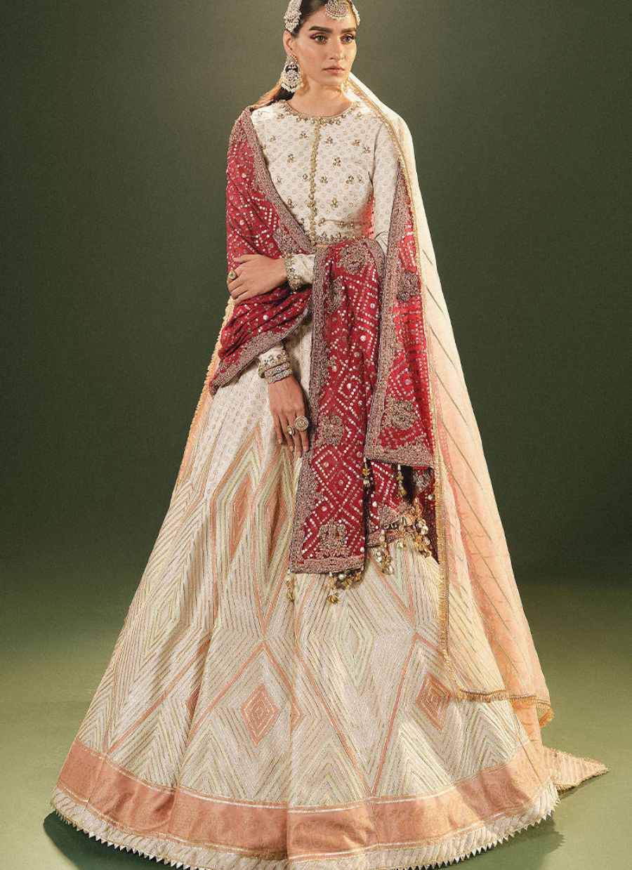 16 Ivory Bridal Lehenga with Geometric Patterns and Traditional Red Dupatta