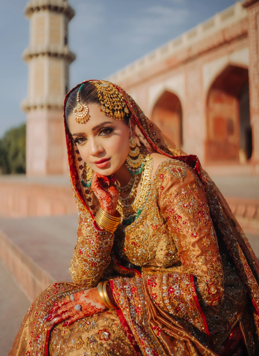 18 Golden and Red Traditional Bridal Dress with Heavy Embellishment