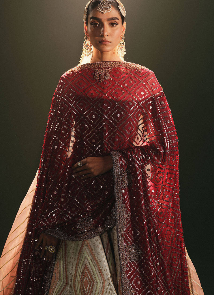 16 Ivory Bridal Lehenga with Geometric Patterns and Traditional Red Dupatta