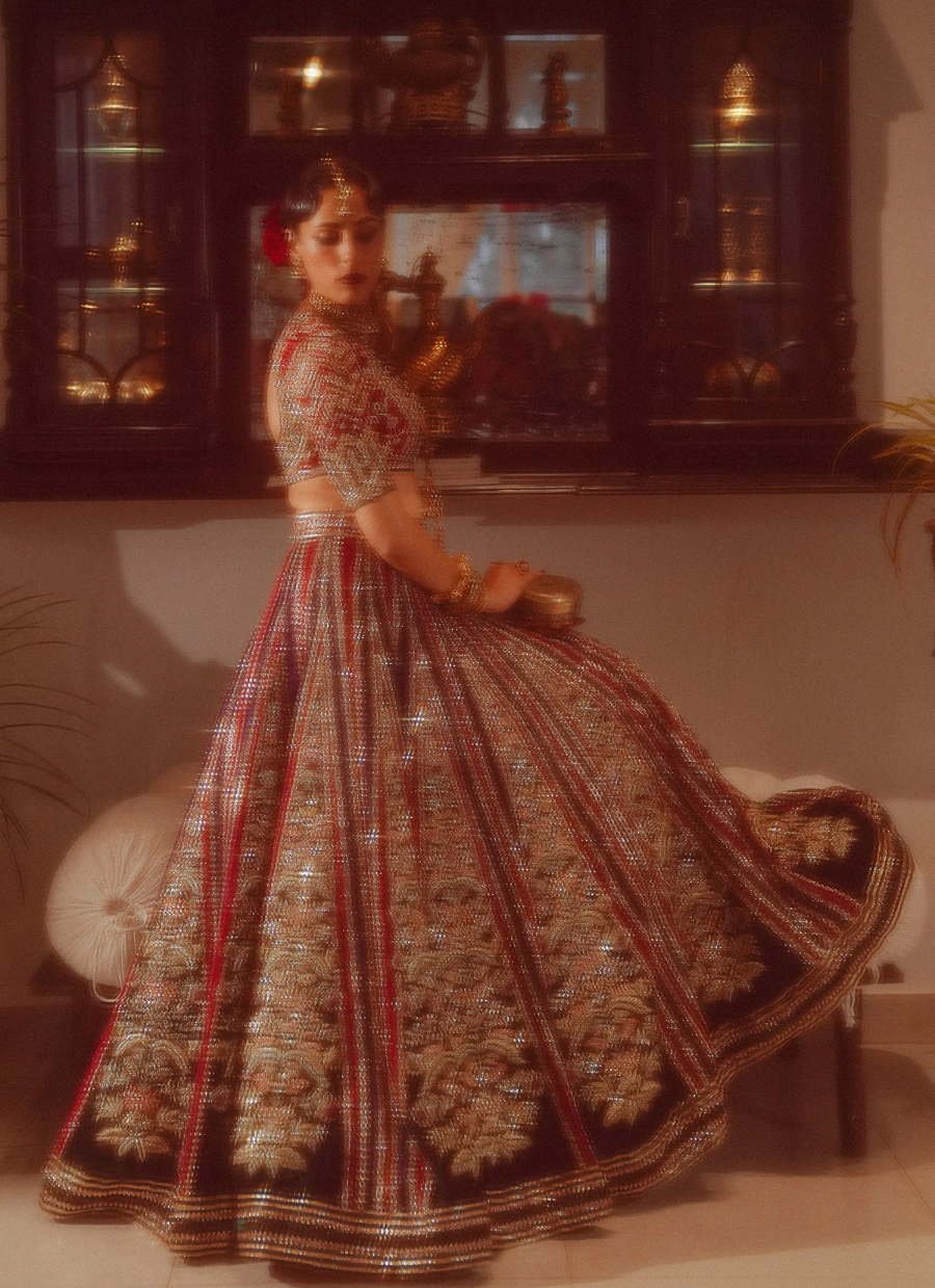 Velvet Elegance – Red & Green Lehnga with Raw Silk Choli