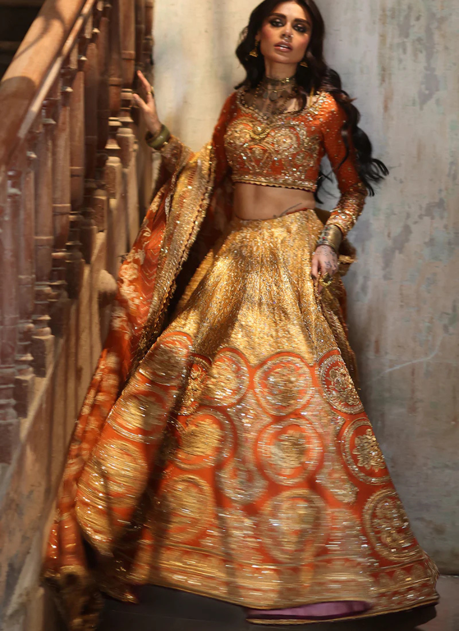 16 Fiery Orange and Gold Bridal Lehenga with Intricate Embellishments